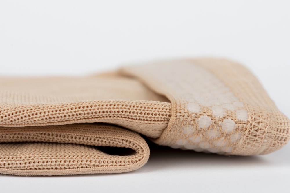 Image of a compression garment a patient will wear after lipedema fat removal surgery